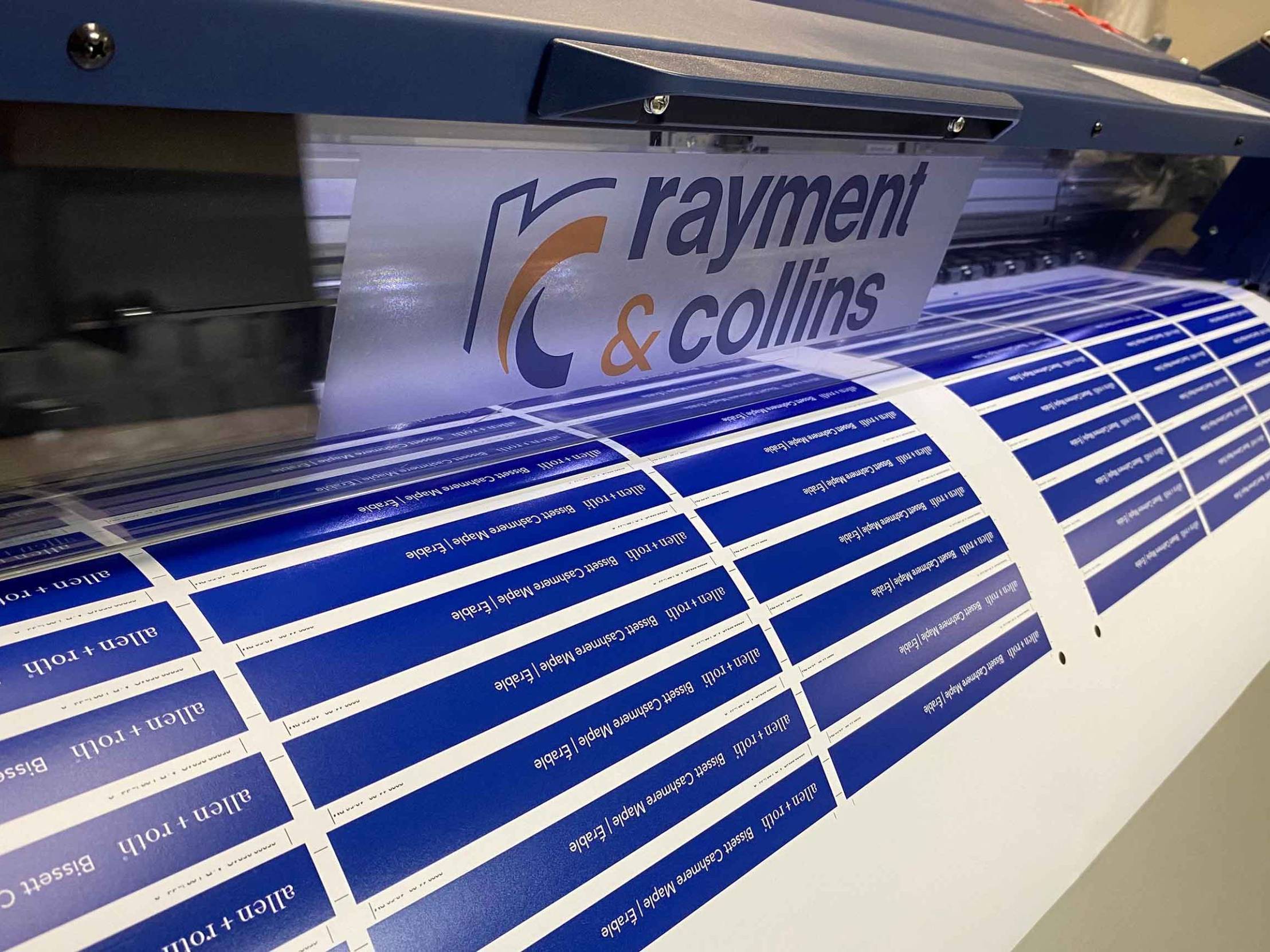 Custom Rayment & Collins branded decals demonstrating precision printed graphic and decal production.