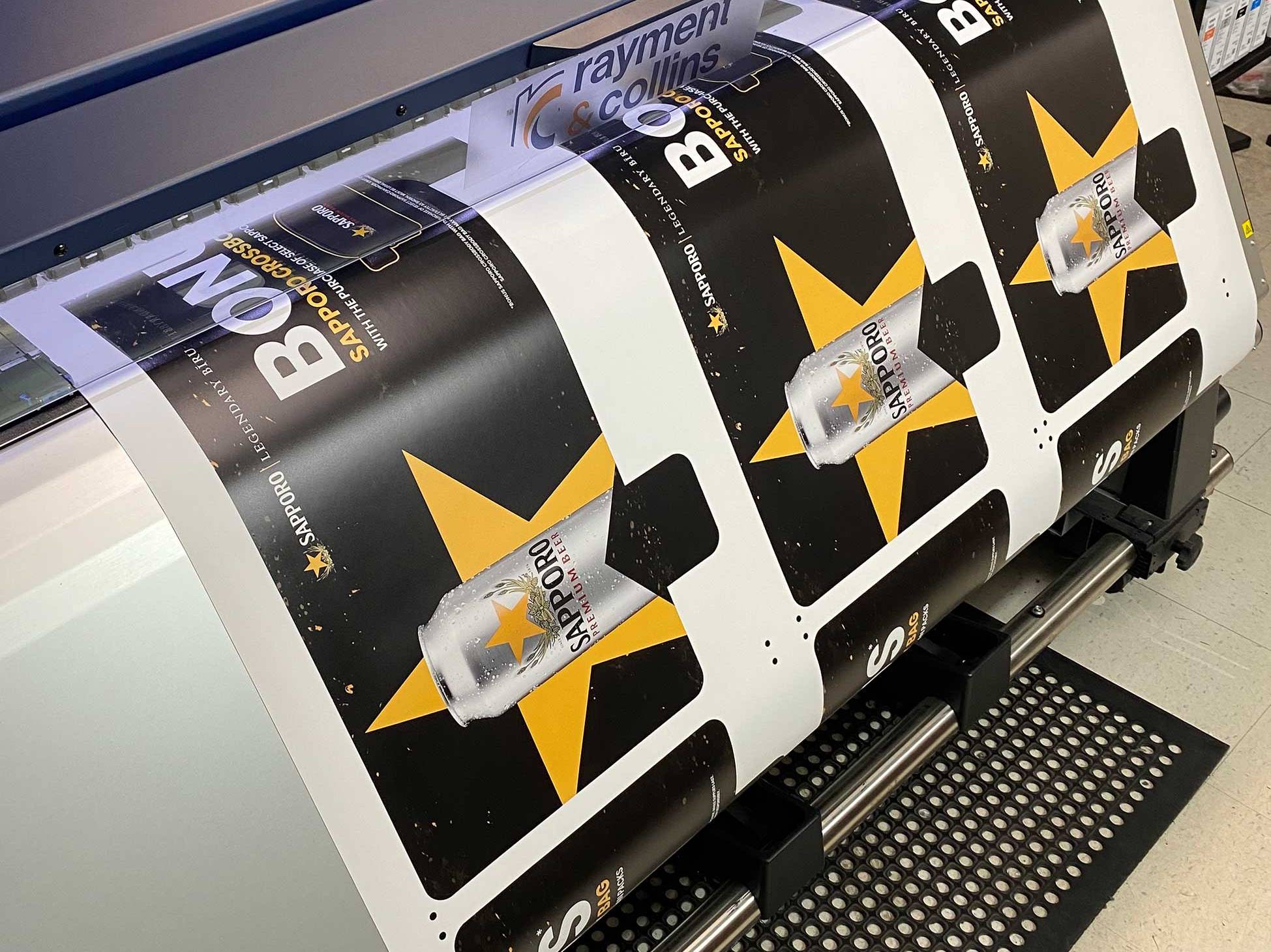 Large format printer producing custom retail backercards and promotional display graphics.