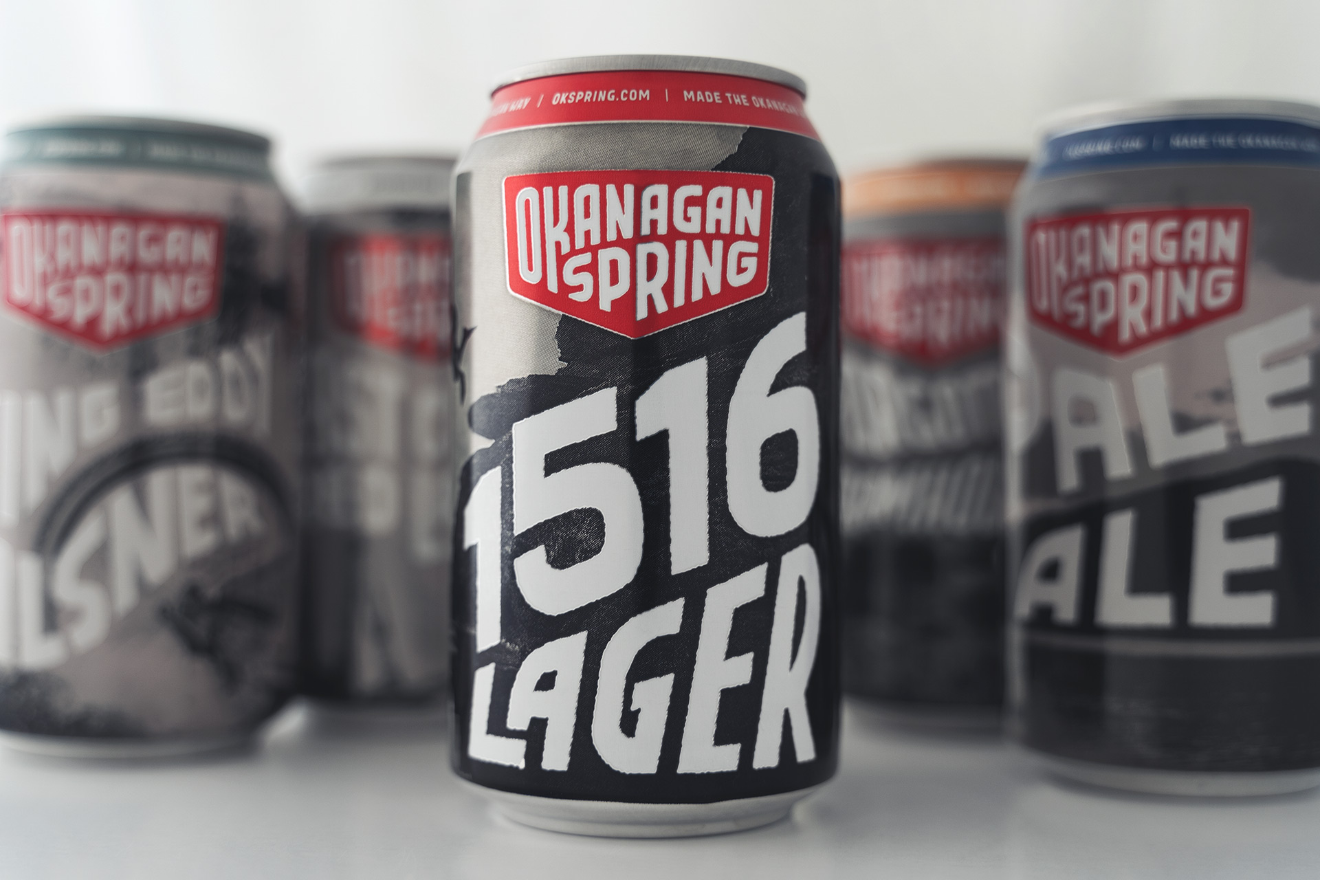 Okanagan Spring 1516 Lager beverage packaging featuring custom branding and retail-ready design.