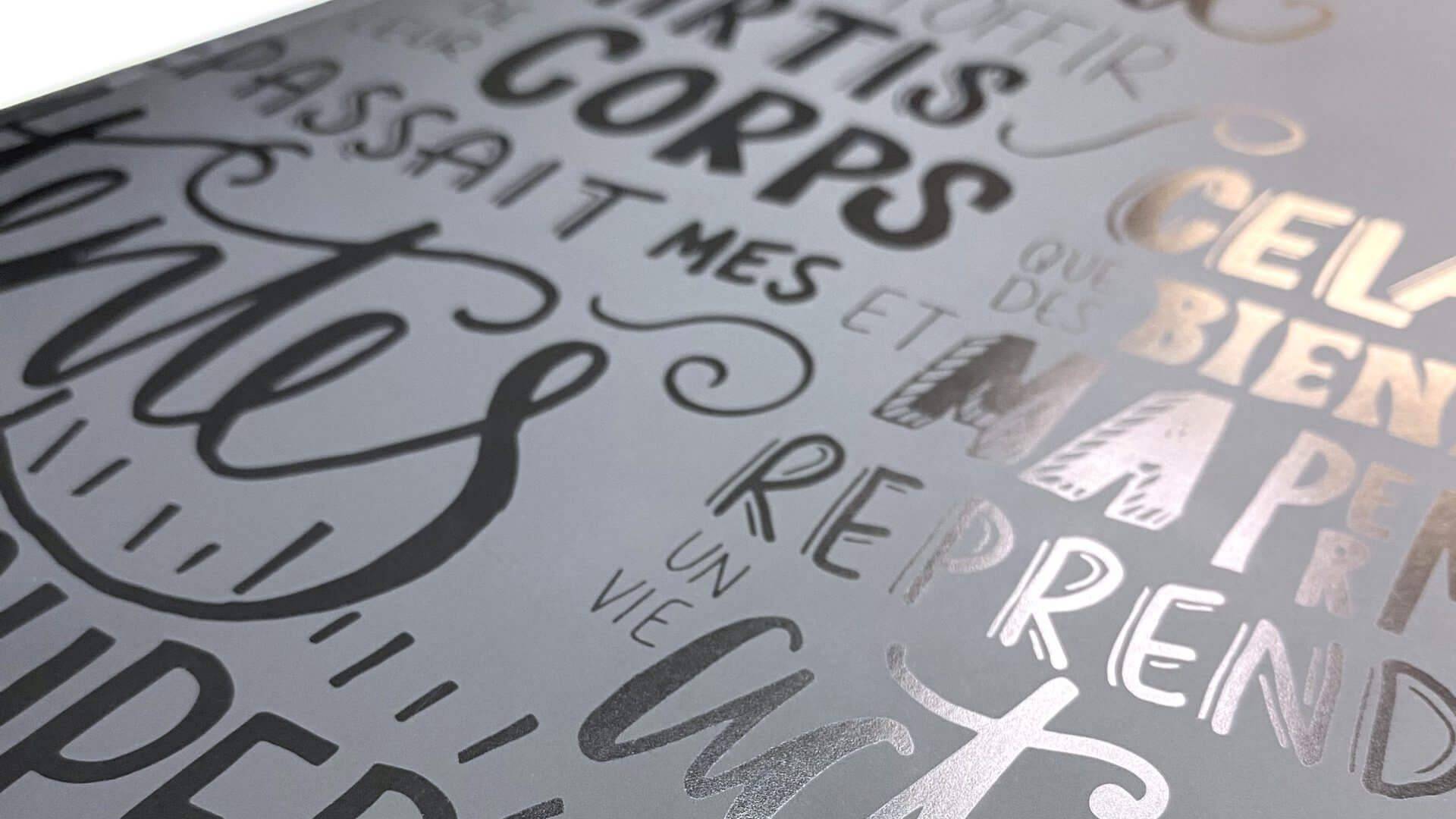 Close-up of printed typography demonstrating UV printing and specialty finishing techniques.